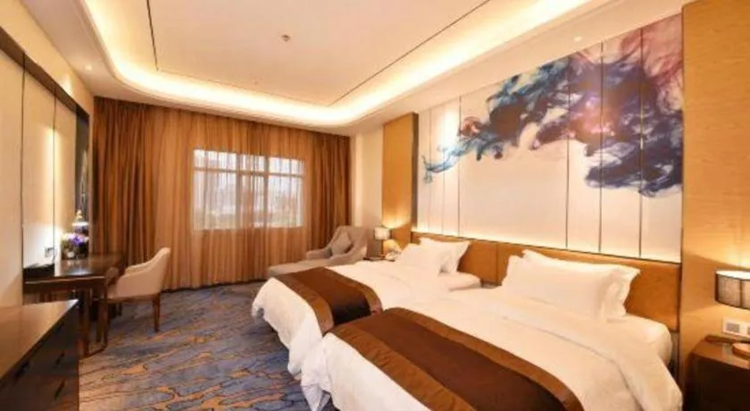 Bed in The Bmc Hotel