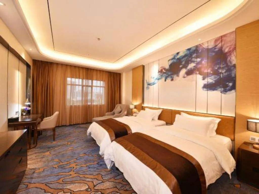 Bed in The Bmc Hotel