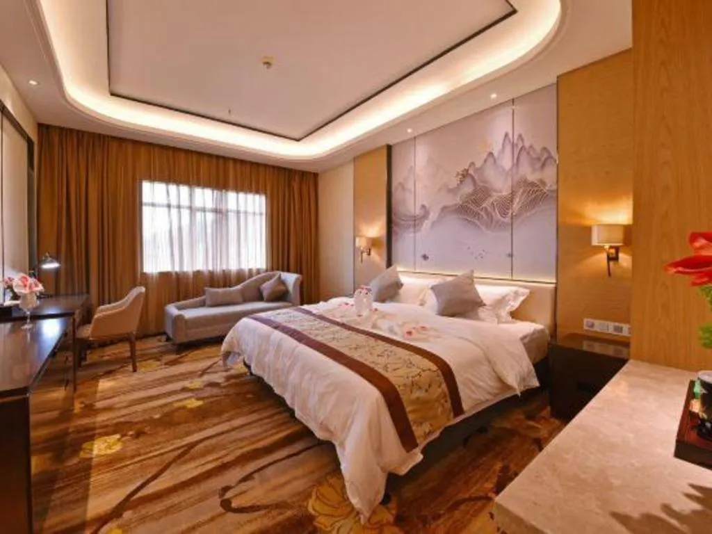 Bed in The Bmc Hotel