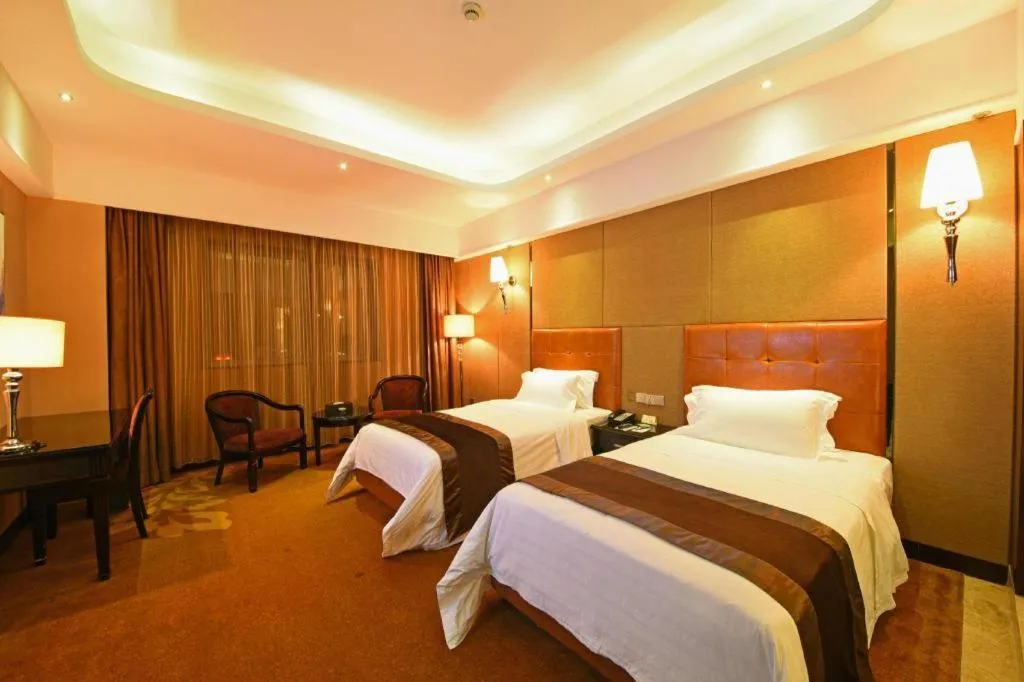 Bed in The Bmc Hotel