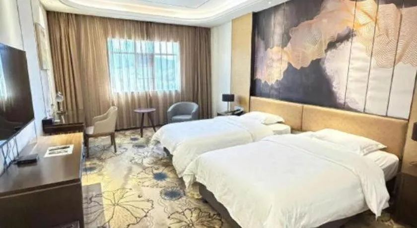 Bed in The Bmc Hotel