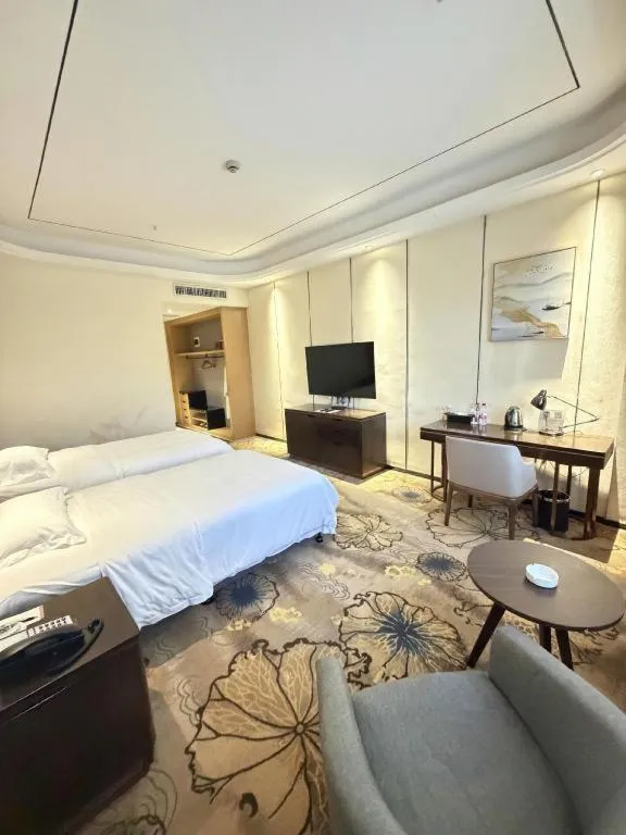 Bed in The Bmc Hotel