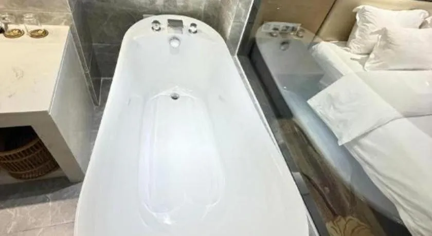 Bed in The Bmc Hotel