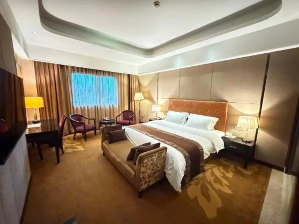 Bed in The Bmc Hotel