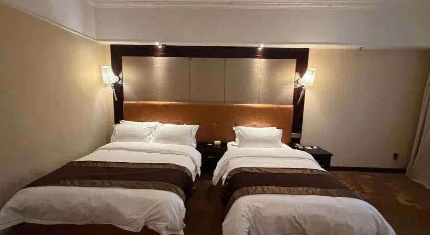 Bed in The Bmc Hotel