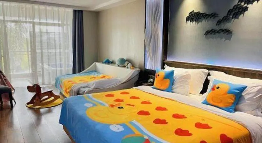 Bed in HuangMa holiday yacht view sea resort hotel