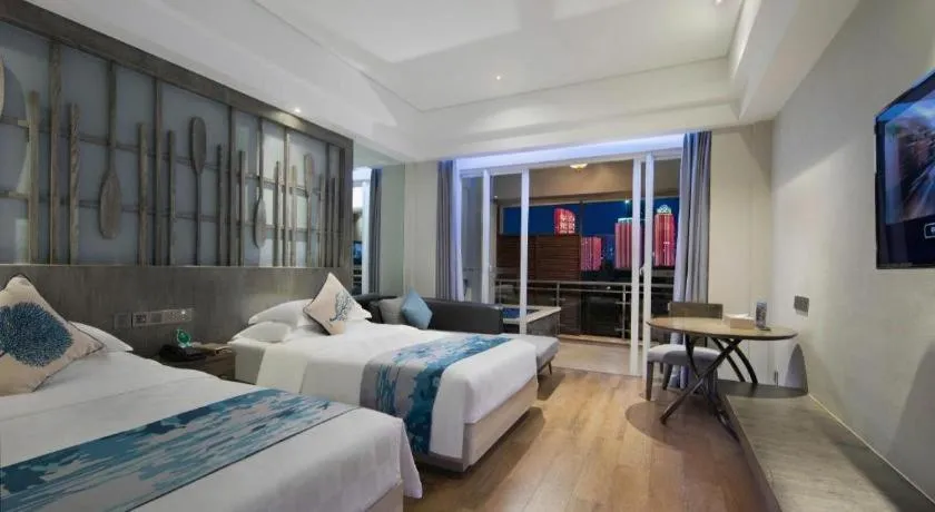 Bed in HuangMa holiday yacht view sea resort hotel