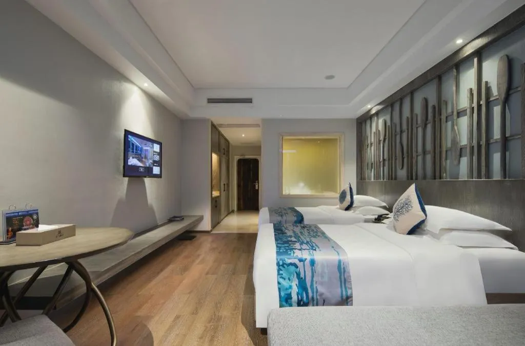 Bed in HuangMa holiday yacht view sea resort hotel