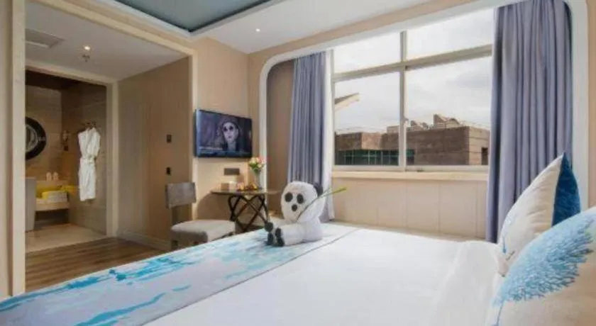 Bed in HuangMa holiday yacht view sea resort hotel