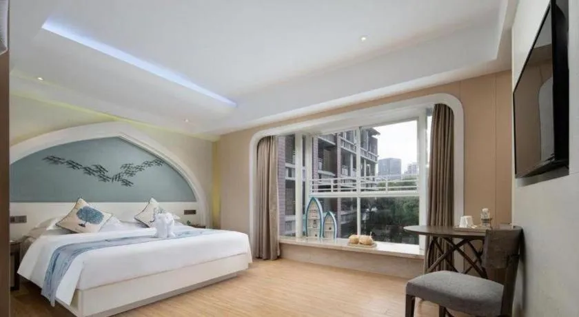 Bed in HuangMa holiday yacht view sea resort hotel