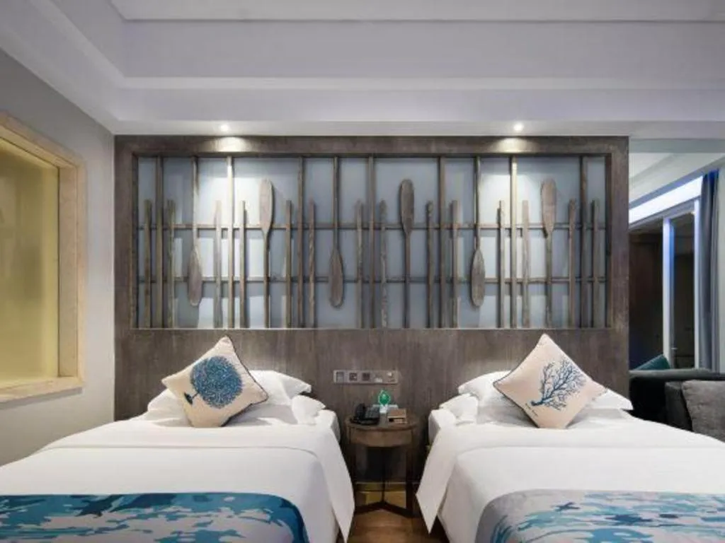 Bed in HuangMa holiday yacht view sea resort hotel