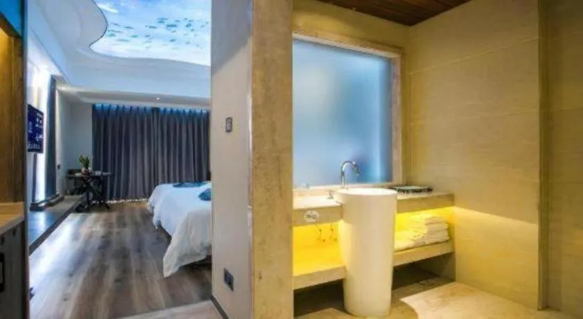 Bed in HuangMa holiday yacht view sea resort hotel