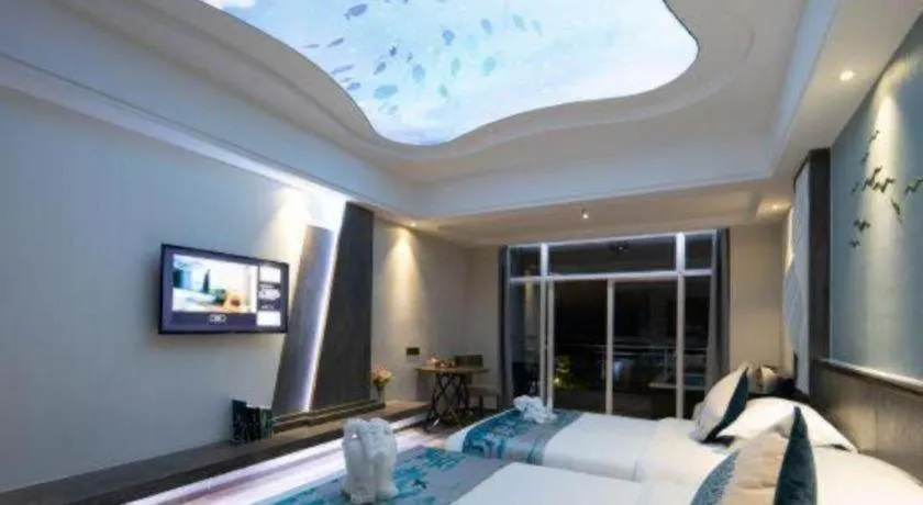 Bed in HuangMa holiday yacht view sea resort hotel