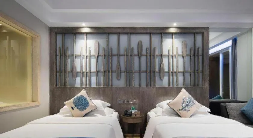 Bed in HuangMa holiday yacht view sea resort hotel