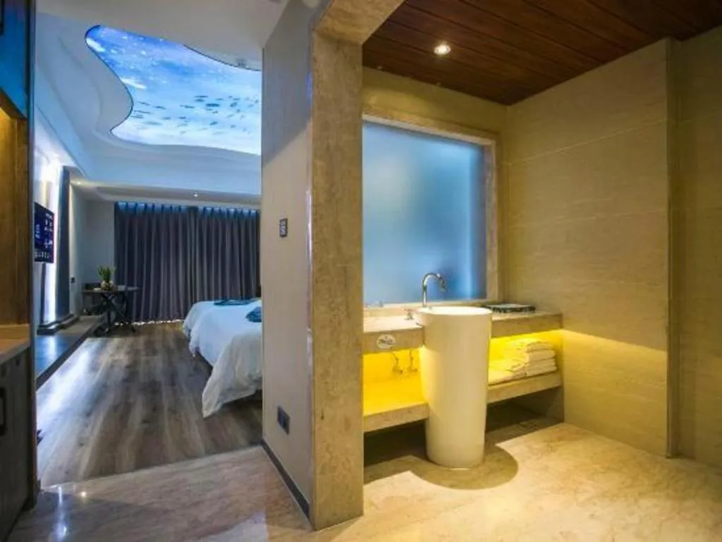 Bed in HuangMa holiday yacht view sea resort hotel