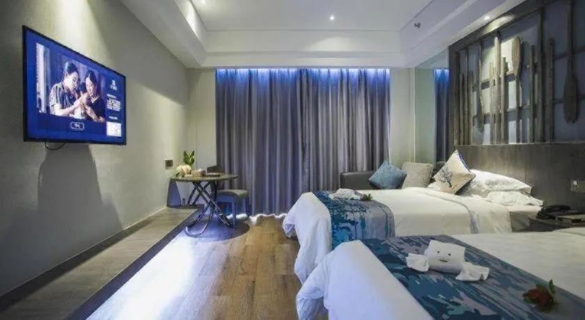 Bed in HuangMa holiday yacht view sea resort hotel