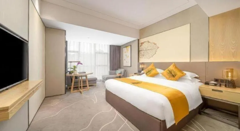 Bed in ZHONG DING HOTEL