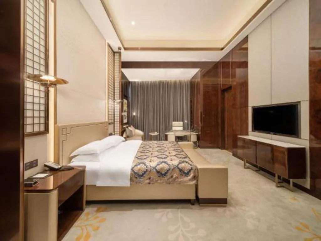 Bed in ZHONG DING HOTEL