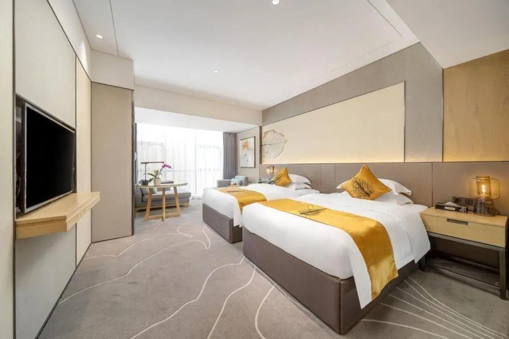 Bed in ZHONG DING HOTEL