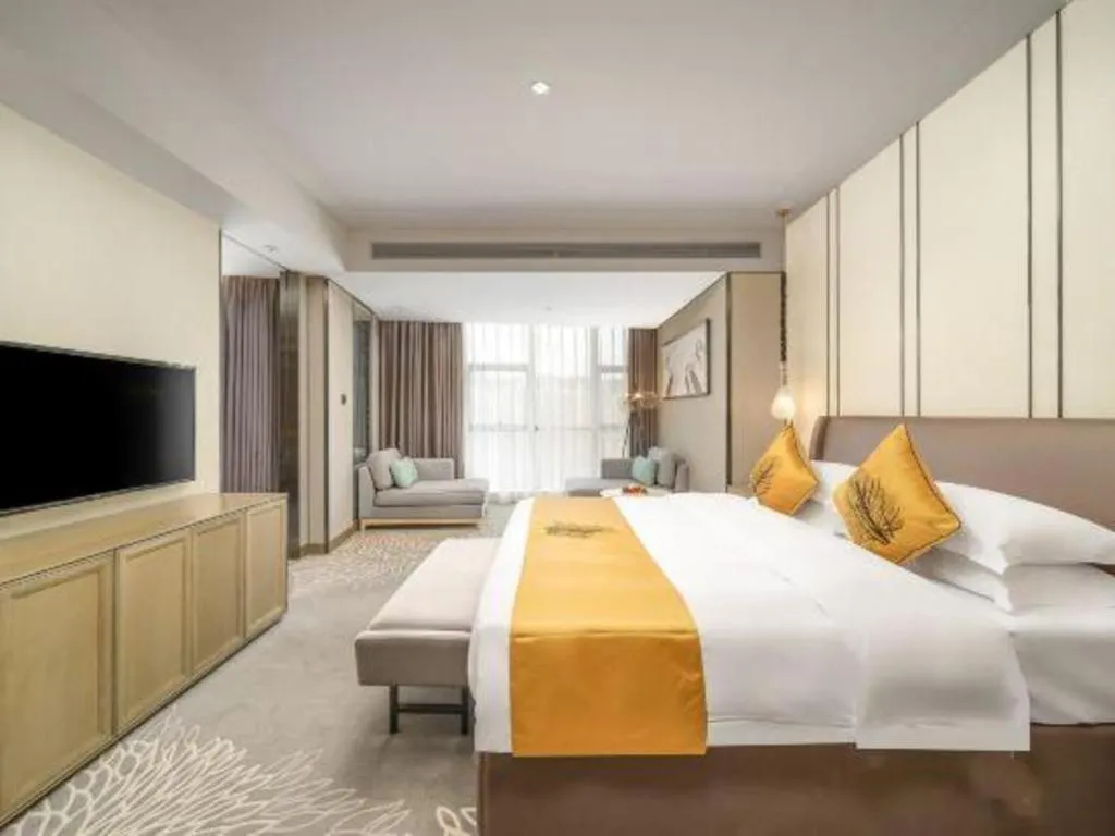 Bed in ZHONG DING HOTEL