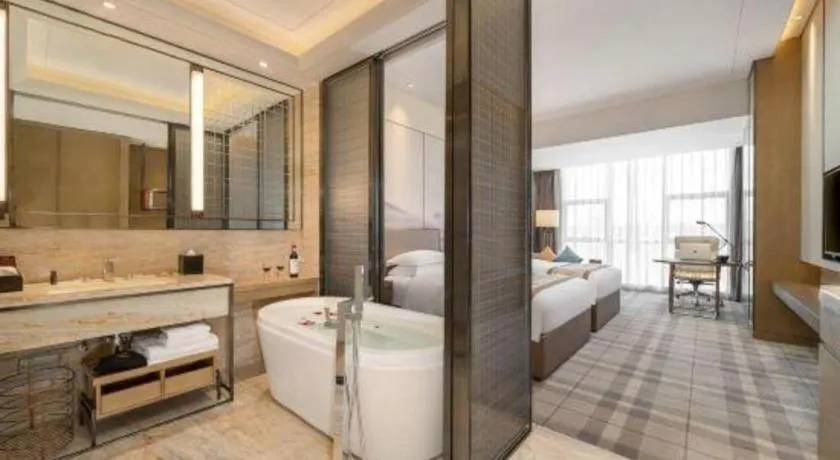 Bed in ZHONG DING HOTEL