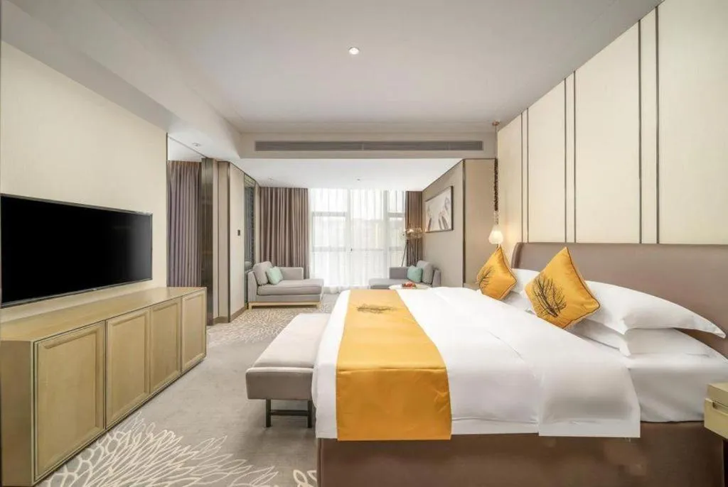 Bed in ZHONG DING HOTEL