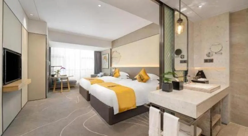 Bed in ZHONG DING HOTEL