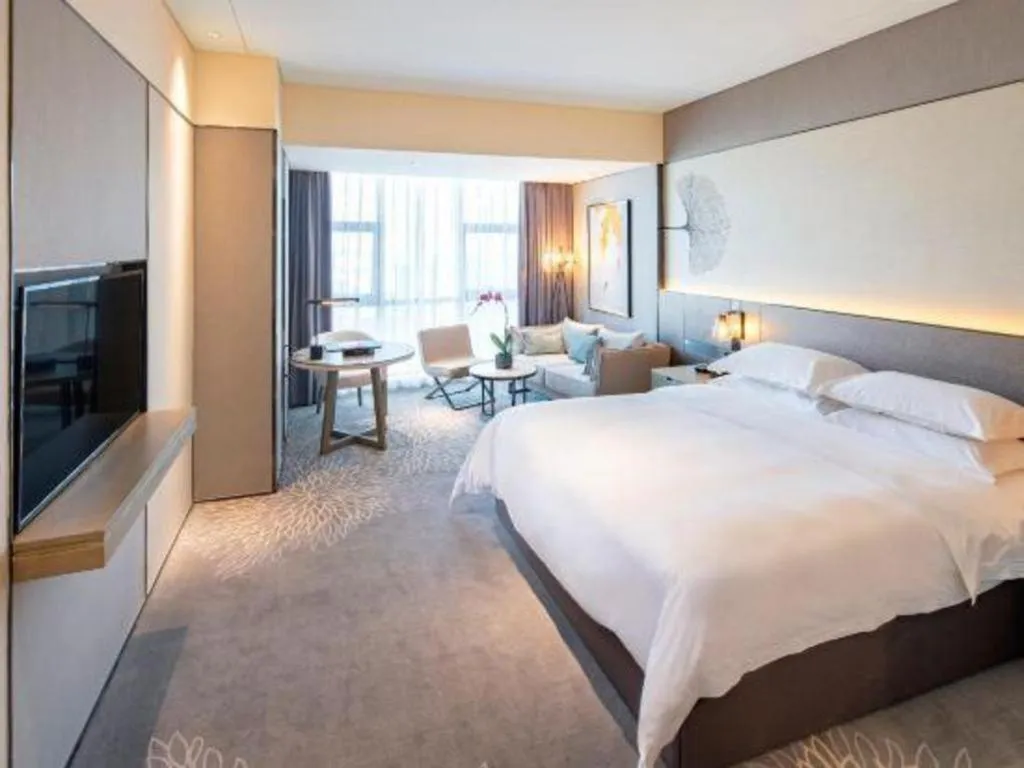 Bed in ZHONG DING HOTEL