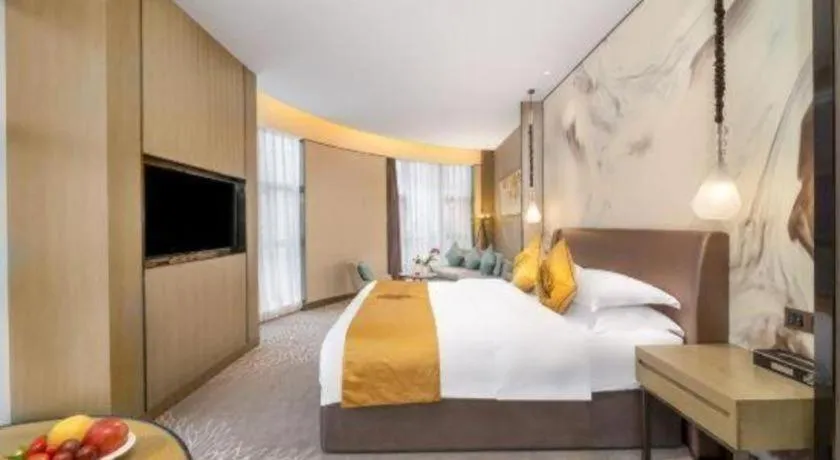 Bed in ZHONG DING HOTEL