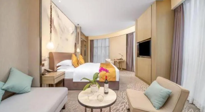 Bed in ZHONG DING HOTEL