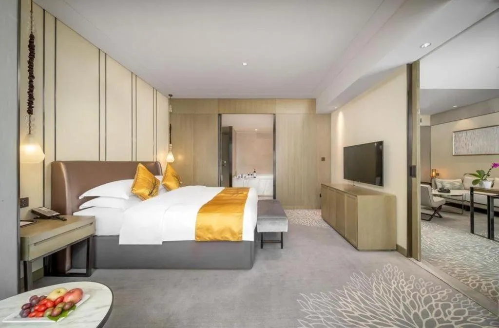 Bed in ZHONG DING HOTEL