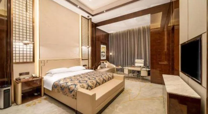 Bed in ZHONG DING HOTEL