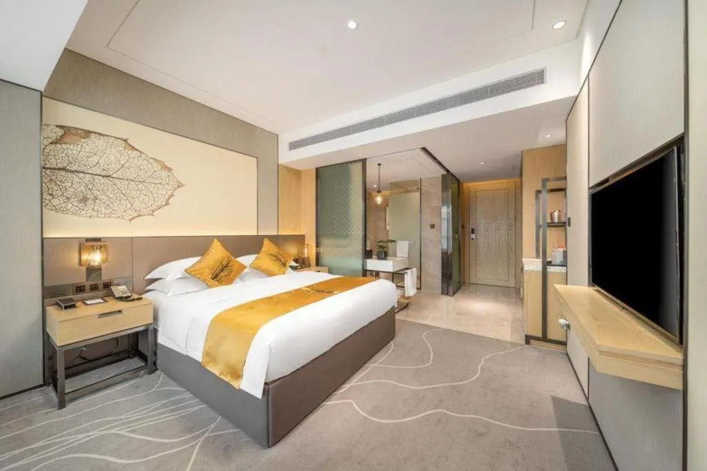 Bed in ZHONG DING HOTEL