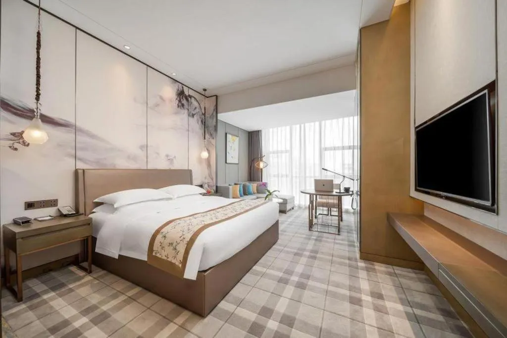 Bed in ZHONG DING HOTEL