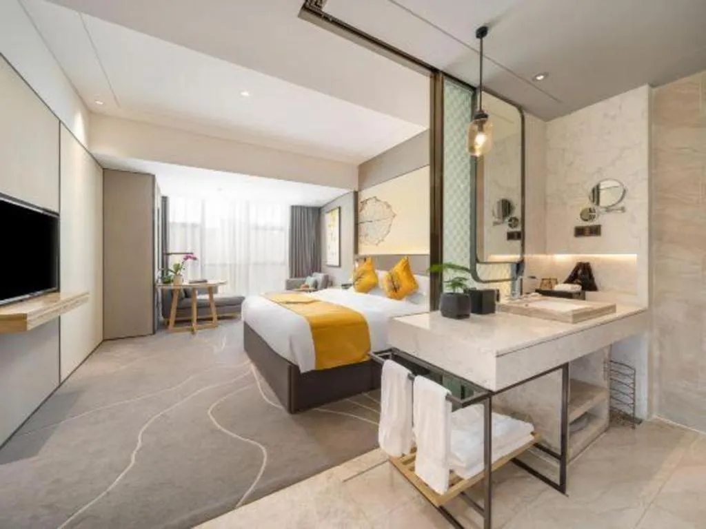 Bed in ZHONG DING HOTEL