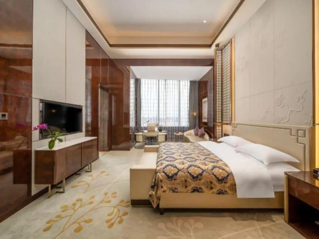 Bed in ZHONG DING HOTEL