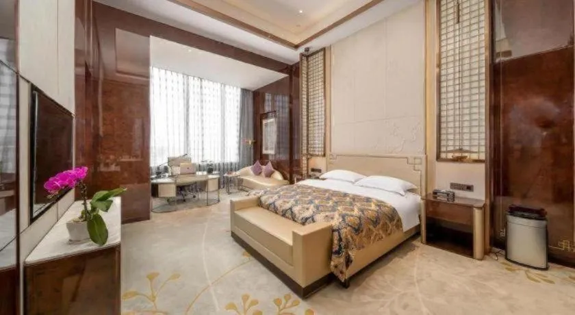 Bed in ZHONG DING HOTEL