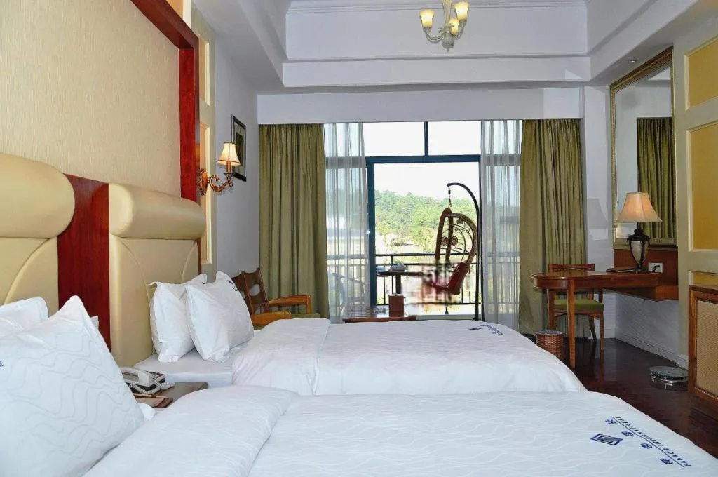 Bed in Shaoguan Palace International Resorts