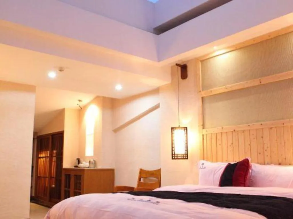 Bed in Shaoguan Palace International Resorts