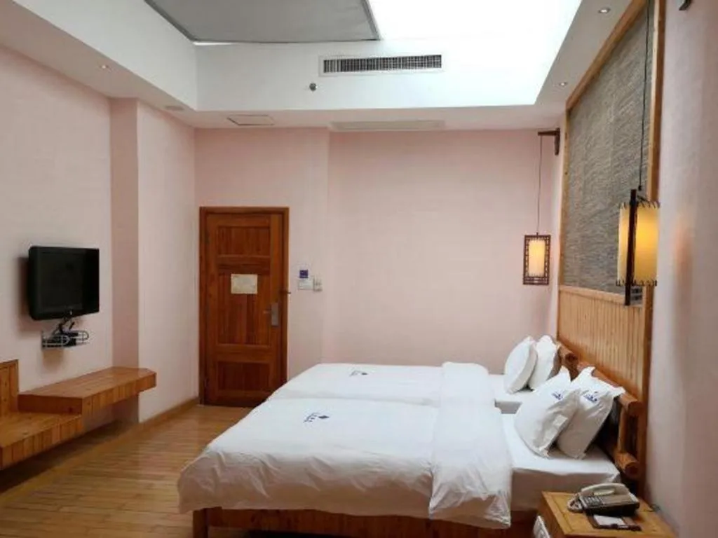 Bed in Shaoguan Palace International Resorts