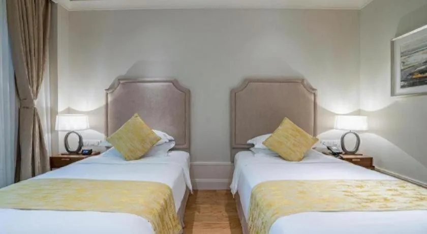 Bed in Donghai Xianhucheng Huanglong Hotel