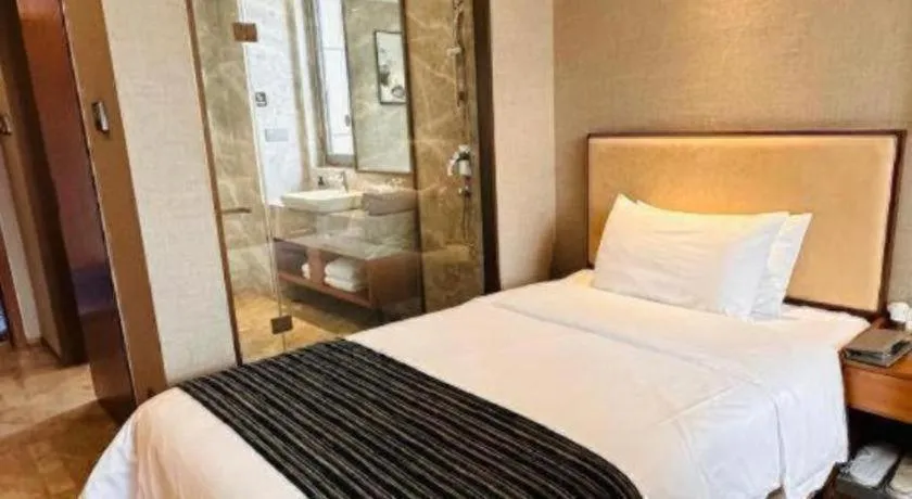 Bed in Ramada Encore by Wyndham Wuhan Caidian