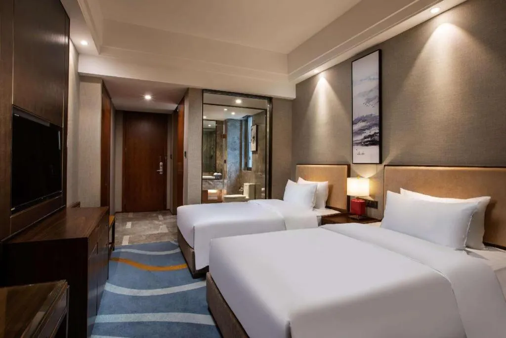 Bed in Ramada Encore by Wyndham Wuhan Caidian