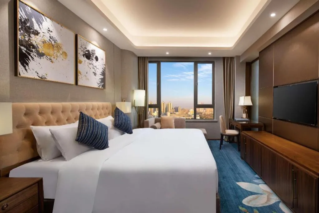 Bed in Ramada Encore by Wyndham Wuhan Caidian
