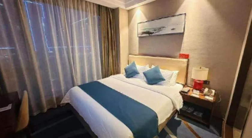 Bed in Ramada Encore by Wyndham Wuhan Caidian