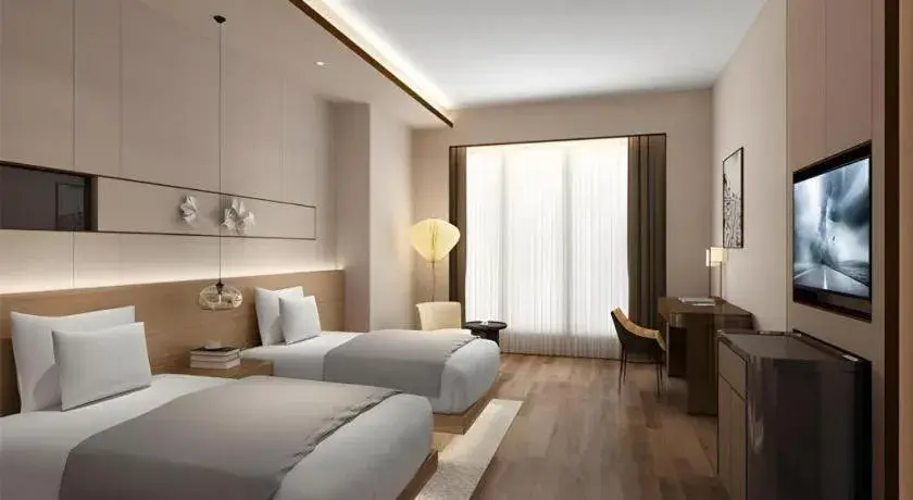 Bed in Metropolo Hotel YunNan Shangri-la Karma Dan Songzanlin Temple Bed in Metropolo Hotel YunNan Shangri-la Karma Dan Songzanlin Temple