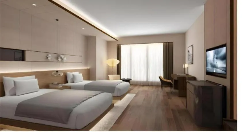 Bed in Metropolo Hotel YunNan Shangri-la Karma Dan Songzanlin Temple