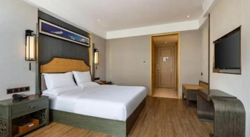 Bed in Metropolo Hotel YunNan Shangri-la Karma Dan Songzanlin Temple Bed in Metropolo Hotel YunNan Shangri-la Karma Dan Songzanlin Temple