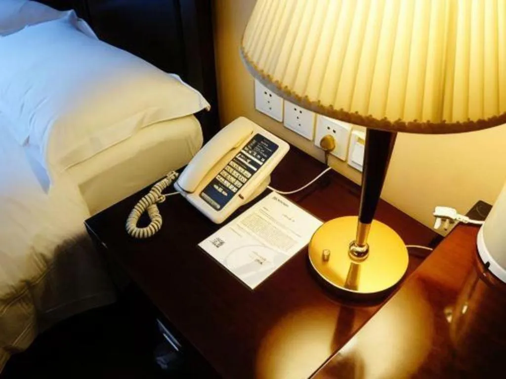 Bed in Hujialou Hot Spring Hotel