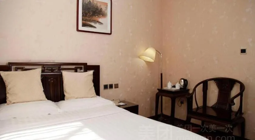 Bed in Hujialou Hot Spring Hotel